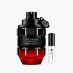 Decant Viktor & Rolf Spicebomb Infrared 100% original, el perfume Ámbar Especiado para hombre con notas de chile rojo, canela, frutos rojos y tabaco, junto al frasco en forma de granada rojo | El Rey de los Perfumes