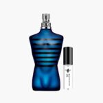 Decant Jean Paul Gaultier Ultra Male EDT 100% original, el ícono dulce especiado con notas de pera y vainilla, junto al frasco torso azul | El Rey de los Perfumes